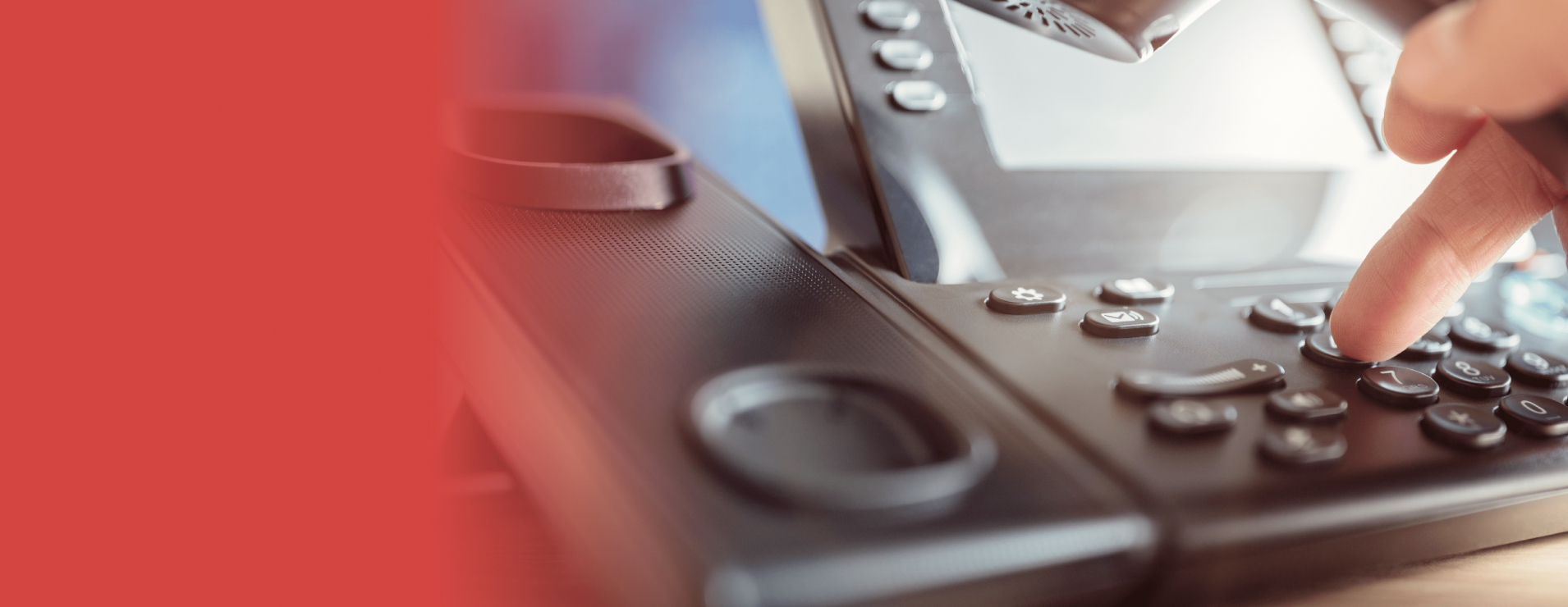 A closeup image of a telephone and answering machine.